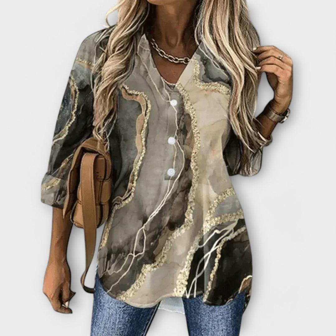 Filine | Elegancia y singularidad en una blusa de dama
