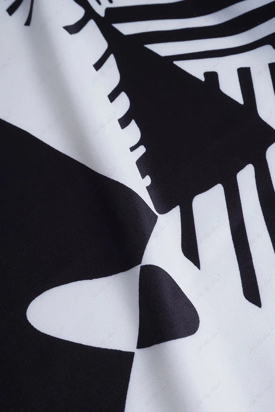 Basilisa | Conjunto de Pierna Ancha con Estampado de Grafiti