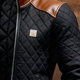 Ramiro - Chaqueta negra acolchada con hombros de cuero